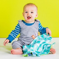 Dečka mazlící  na C kroužku Little Taggies palmy 0m+