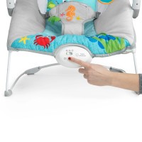 BABY EINSTEIN Lehátko hudební vibrační se světly Kick to It Neptune do 9 kg