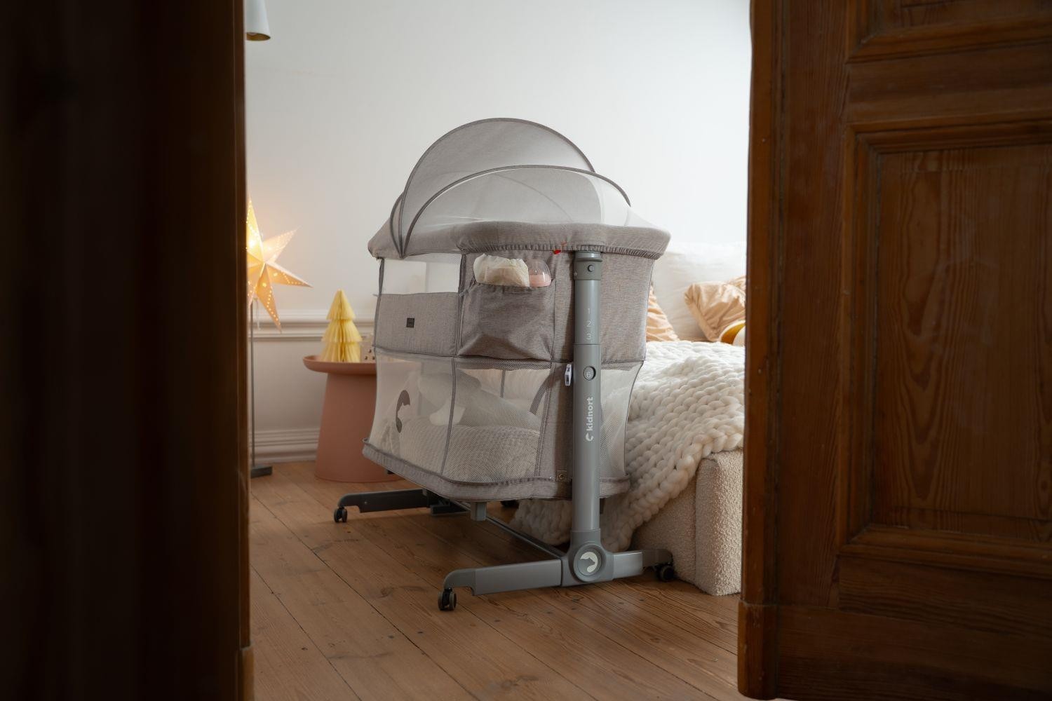 KIDNORT Postýlka Snäckskal