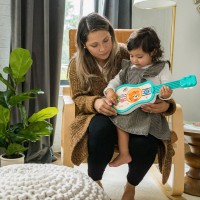 BABY EINSTEIN Hračka hudební dřevěná ukulele Magic Touch HAPE 6m+