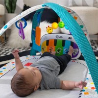 BABY EINSTEIN Postýlka s ohrádkou na hraní a klavírem 3v1 Kick & Snooze™ 0m+